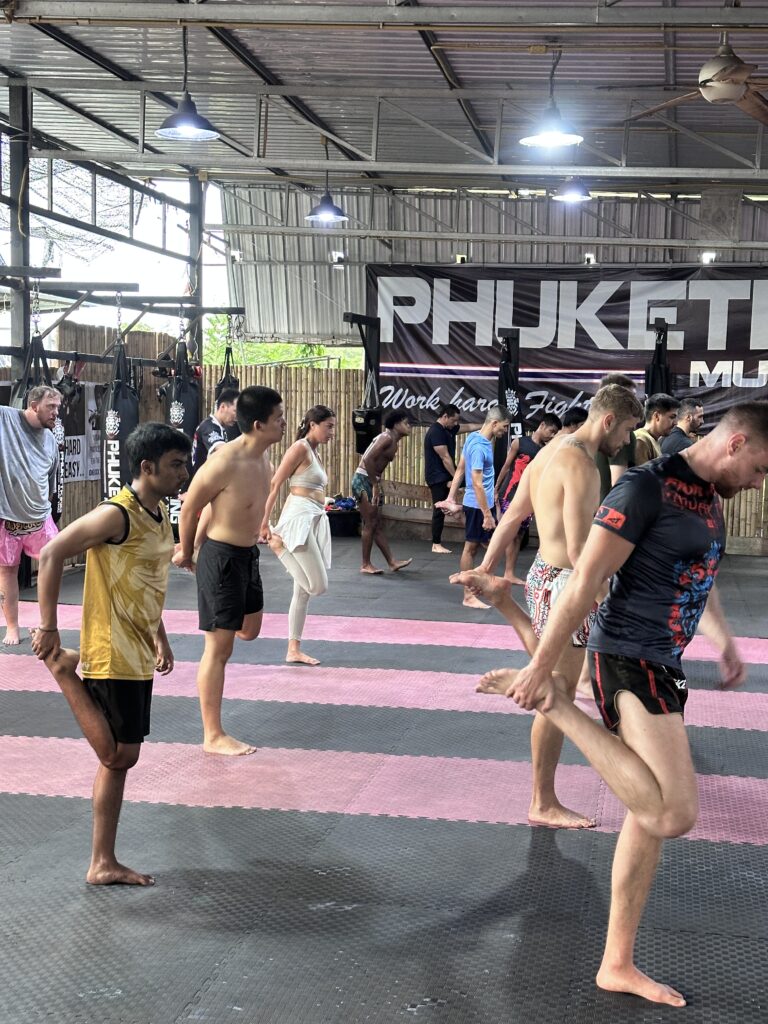 Warming up and stretching is a key part of Muay Thai